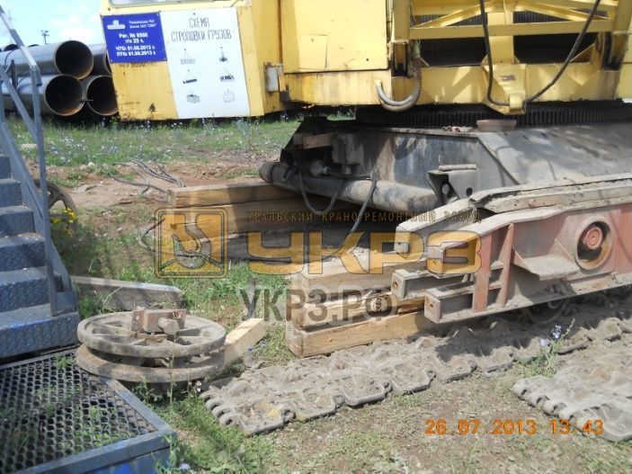Демонтаж натяжного колеса крана ДЭК-251 Демонтаж натяжного колеса крана ДЭК-251